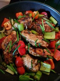 High angle view of chopped vegetables in cooking pan