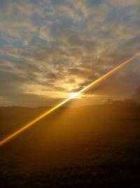 Scenic view of landscape against sky during sunset