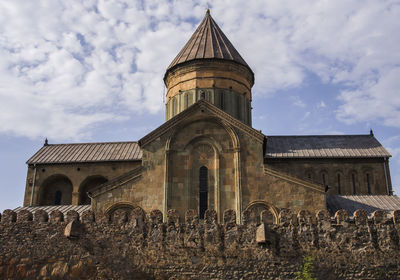 Low angle view of svetitskhoveli cathedral against sky