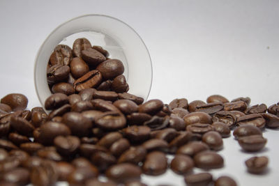 Close-up of coffee beans on table