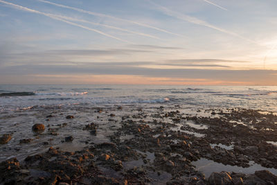 Scenic view of sea against sky during sunset