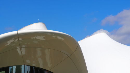 Low angle view of building against clear blue sky