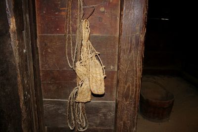 Close-up of horse hanging on wood