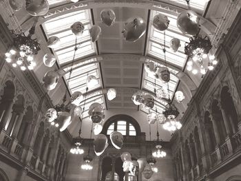 Low angle view of illuminated ceiling