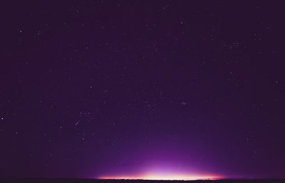 Scenic view of sea against sky at night