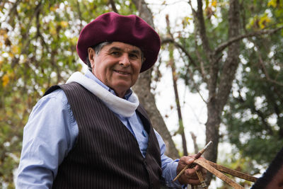 Senior adult argentinian man wearing traditional clothing