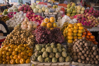 Various fruits for sale at market stall