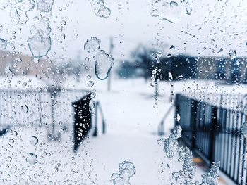 Full frame shot of wet glass window