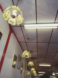 Low angle view of illuminated chandelier