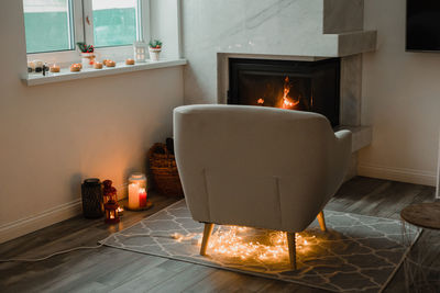 Tea light candles on table at home