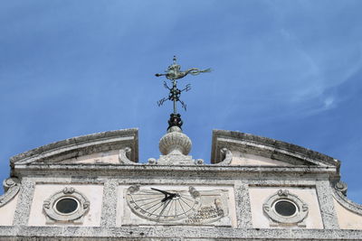 Low angle view of statue against sky