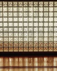 Close-up of glass window on tiled floor