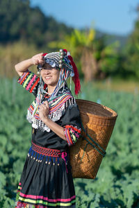 Portrait of girl wearing mask outdoors