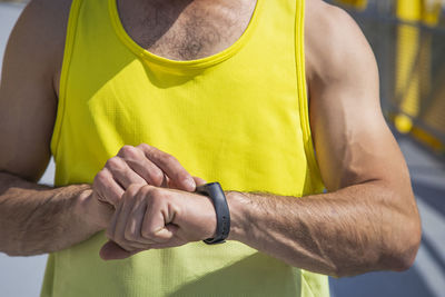 Close-up of man hand with arms raised