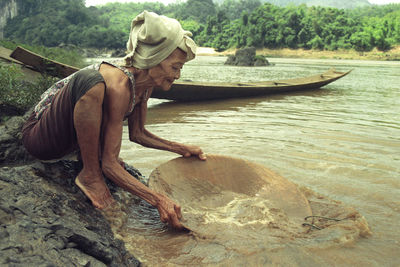 Side view of man in water