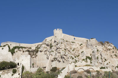 Low angle view of fortress san nicola