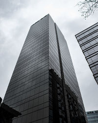 Low angle view of skyscraper against sky