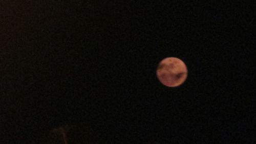 Low angle view of moon in sky