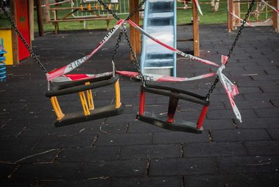 High angle view of empty swing in playground