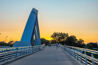 Bridge against sky during sunset