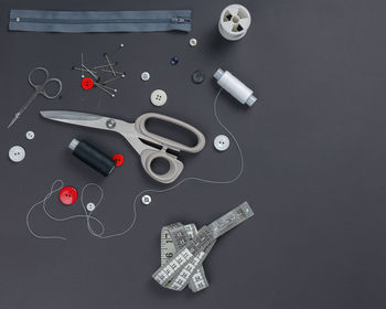 High angle view of equipment on table against black background