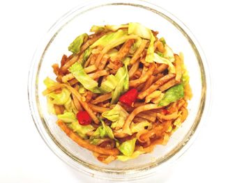 High angle view of food in bowl on white background