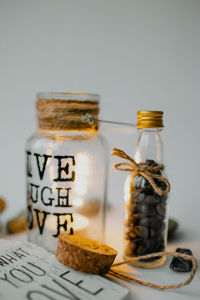 Close-up of drink served on table against white background