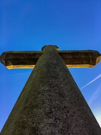 Low angle view of built structure against blue sky