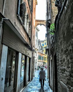 Woman standing in front of building