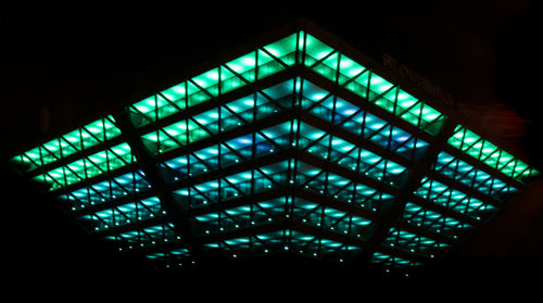 Low angle view of illuminated ceiling