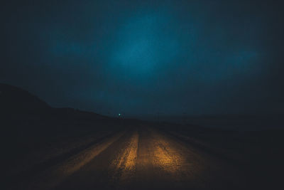 View of empty road at night
