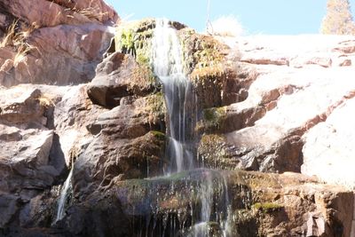 Low angle view of waterfall