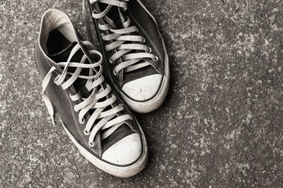 High angle view of shoes on the ground