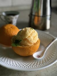 Orange sorbet with a cup of coffee