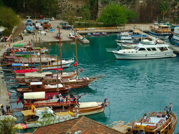 High angle view of boats moored at harbor