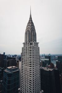 Modern cityscape against sky