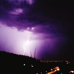 Silhouette of lightning at night