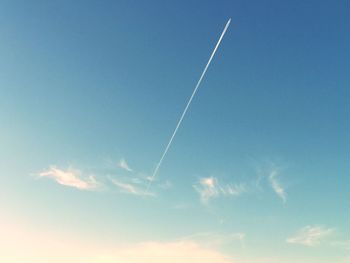 Low angle view of vapor trail in sky