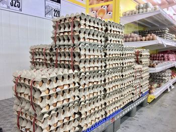 Stacked eggs in cartons at supermarket