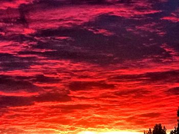 Low angle view of dramatic sky at sunset