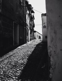 Narrow alley along buildings