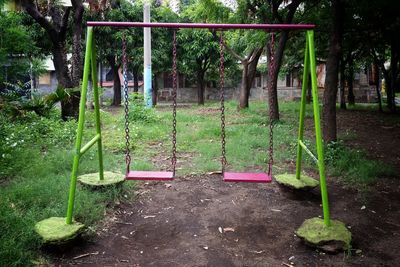 Empty swing in park