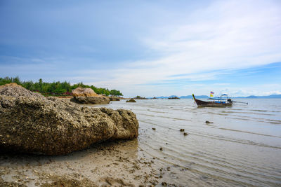 Scenic view of beach against sky