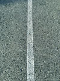 High angle view of road marking on street