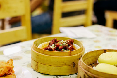 Close-up of fruits in plate on table