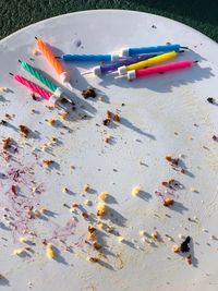 High angle view of multi colored umbrella on sand