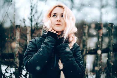 Portrait of woman in snow