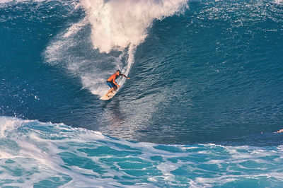 Man surfing in sea