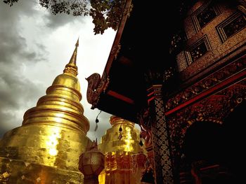 Low angle view of statue against sky