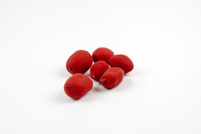 Close-up of strawberries against white background